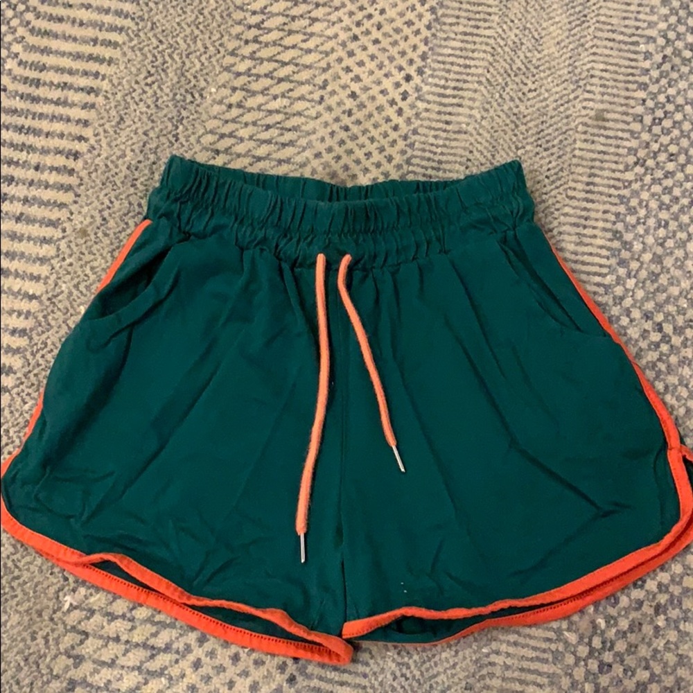 Green and orange lines dolphin shorts